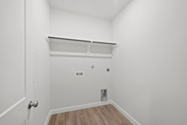 10713 Blocker Ct, Bryan, TX 77801 - laundry area with electric dryer hookup, hookup for a gas dryer, wood finished floors, and hookup for a washing machine