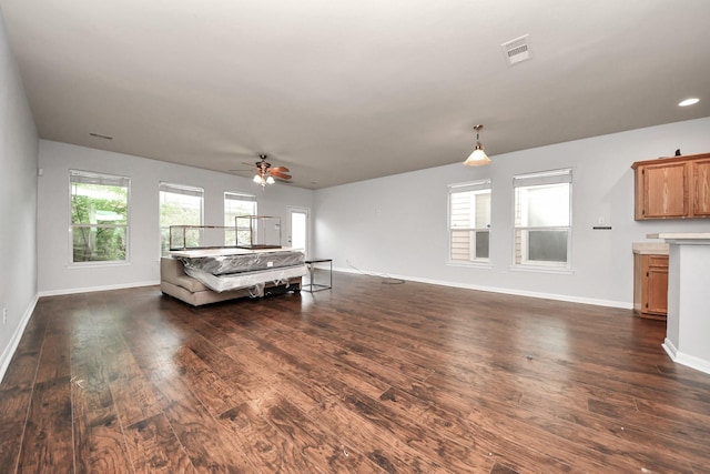 8030 Grow Ln, Houston, TX 77040 - living area with dark wood finished floors and ceiling fan
