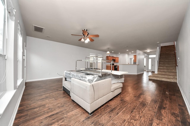 8030 Grow Ln, Houston, TX 77040 - living room featuring a ceiling fan, dark wood finished floors, stairs, and recessed lighting