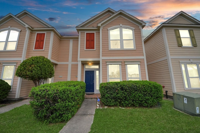8030 Grow Ln, Houston, TX 77040 - townhome / multi-family property featuring a lawn