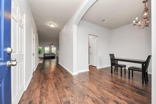 8030 Grow Ln, Houston, TX 77040 - foyer with arched walkways, wood finished floors, and a chandelier