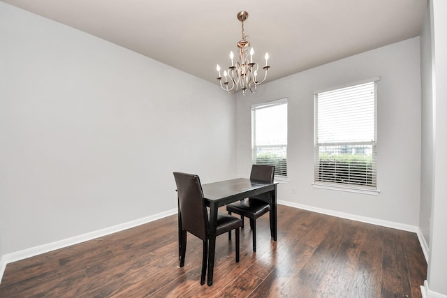 8030 Grow Ln, Houston, TX 77040 - dining room with a chandelier and dark wood-type flooring