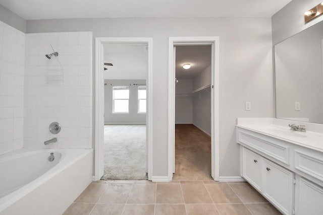 8030 Grow Ln, Houston, TX 77040 - bathroom with vanity, tile patterned flooring, shower / bath combination, and a walk in closet