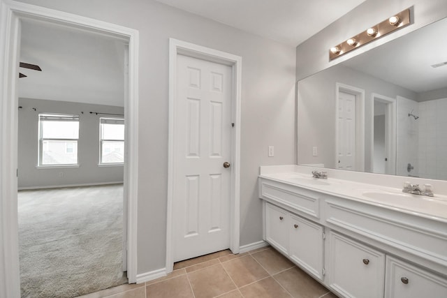 8030 Grow Ln, Houston, TX 77040 - bathroom featuring double vanity, a tile shower, and tile patterned floors