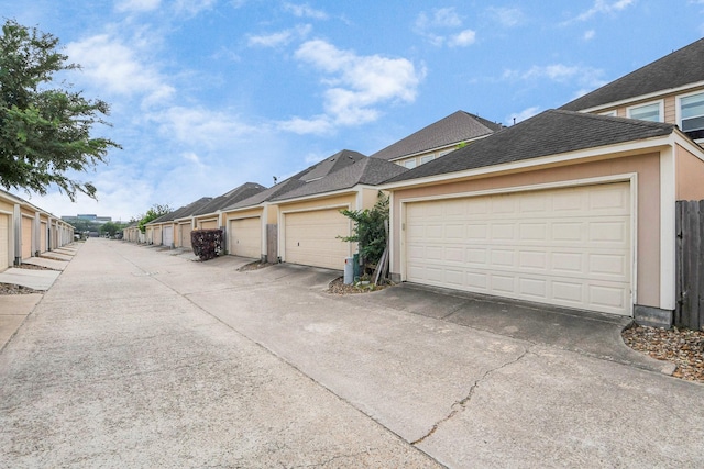 8030 Grow Ln, Houston, TX 77040 - view of concrete road with community garages