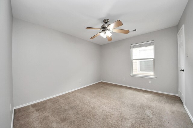 8030 Grow Ln, Houston, TX 77040 - carpeted empty room with a ceiling fan and baseboards