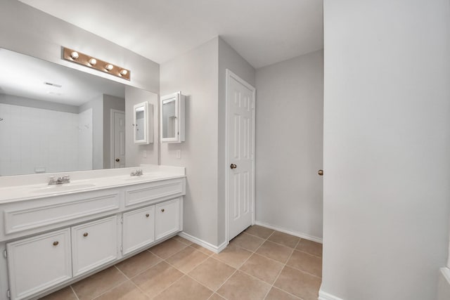8030 Grow Ln, Houston, TX 77040 - full bath featuring double vanity and tile patterned floors