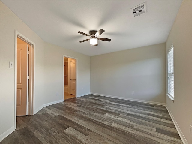 8839 Hazel Rose Sky Dr, Humble, TX 77338 - spare room featuring ceiling fan and dark wood-style flooring