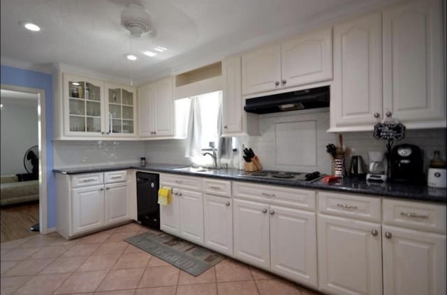 4107 Cypress Lake Dr, Spring, TX 77388 - kitchen featuring under cabinet range hood, dishwasher, dark countertops, backsplash, and glass insert cabinets