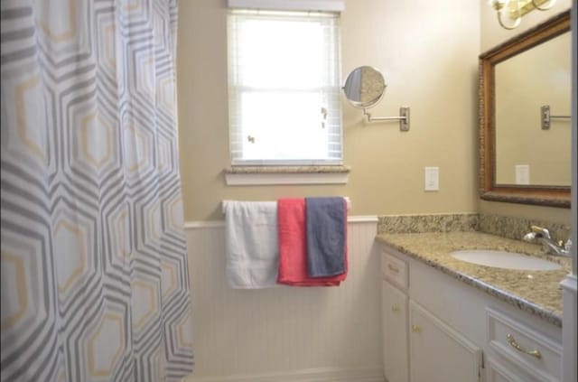 4107 Cypress Lake Dr, Spring, TX 77388 - bathroom featuring vanity and wainscoting