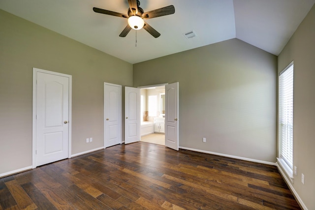 9847 Bestin Ln, Houston, TX 77065 - unfurnished bedroom with wood finished floors, ensuite bath, vaulted ceiling, and a ceiling fan
