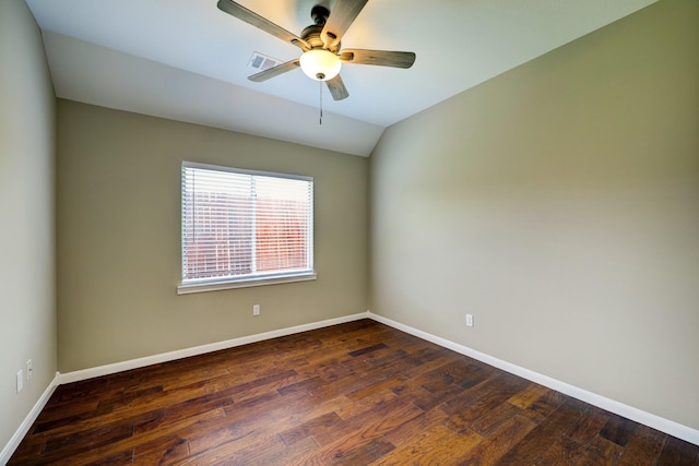 9847 Bestin Ln, Houston, TX 77065 - spare room featuring dark wood-type flooring, ceiling fan, and lofted ceiling