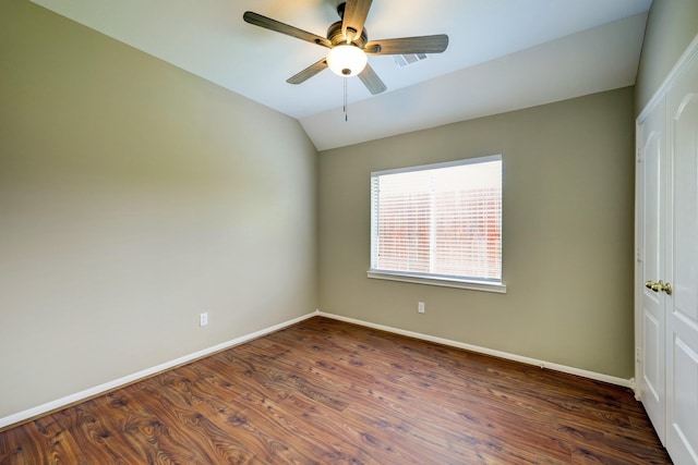 9847 Bestin Ln, Houston, TX 77065 - spare room with dark wood finished floors, a ceiling fan, and lofted ceiling