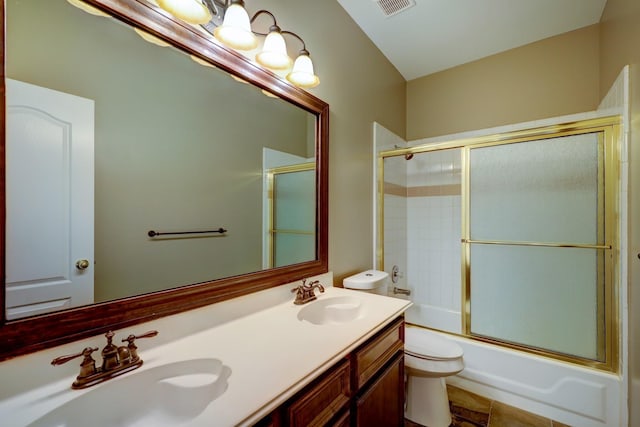 9847 Bestin Ln, Houston, TX 77065 - bathroom featuring double vanity and enclosed tub / shower combo