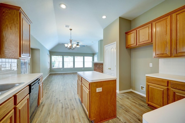 9847 Bestin Ln, Houston, TX 77065 - kitchen featuring dishwashing machine, a chandelier, light wood-style flooring, tasteful backsplash, and light countertops