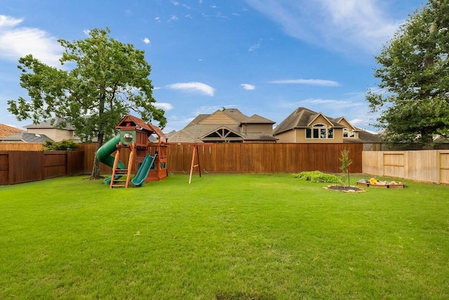 13839 Oak Fair Bnd, Cypress, TX 77429 - fenced backyard featuring a playground