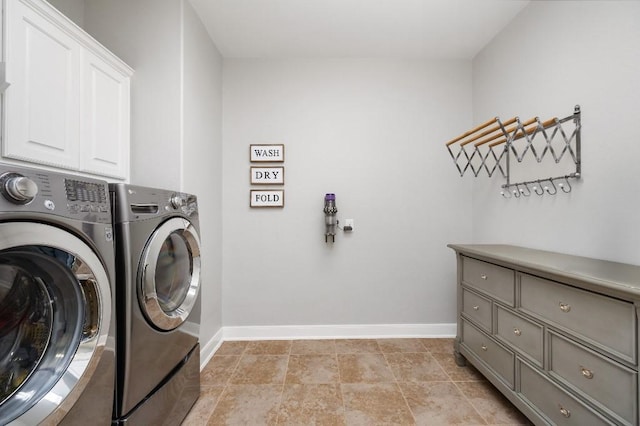 13839 Oak Fair Bnd, Cypress, TX 77429 - washroom with washing machine and clothes dryer and cabinet space
