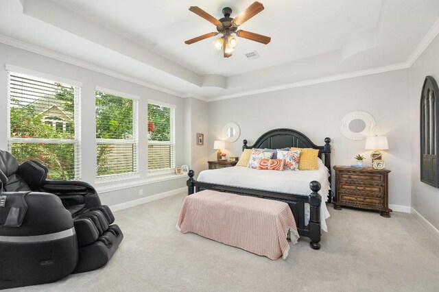 13839 Oak Fair Bnd, Cypress, TX 77429 - carpeted bedroom with a tray ceiling, ornamental molding, and a ceiling fan
