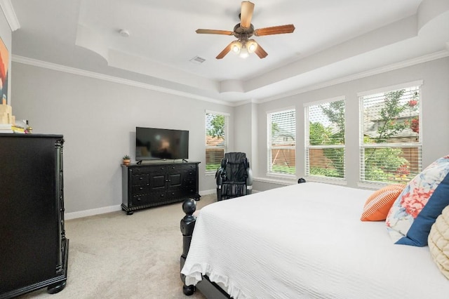 13839 Oak Fair Bnd, Cypress, TX 77429 - bedroom with a raised ceiling, light colored carpet, a ceiling fan, and crown molding