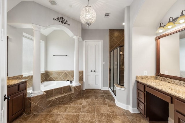 13839 Oak Fair Bnd, Cypress, TX 77429 - full bathroom featuring ornate columns, vanity, a shower stall, a garden tub, and a chandelier