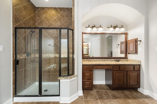 13839 Oak Fair Bnd, Cypress, TX 77429 - full bathroom featuring vanity, a stall shower, and tile patterned floors