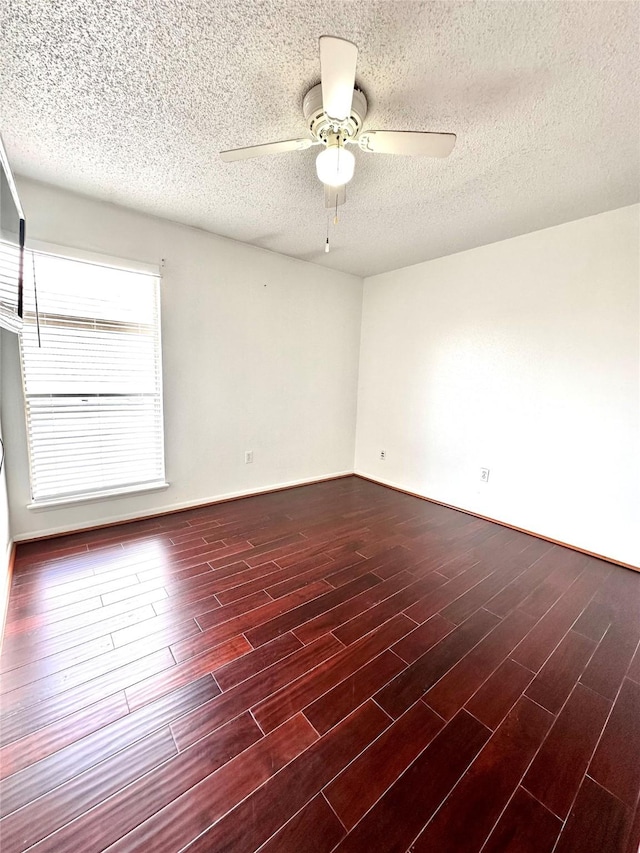 260 El Dorado Blvd Unit 2608, Houston, TX 77598 - unfurnished room featuring ceiling fan, dark wood-style floors, and a textured ceiling