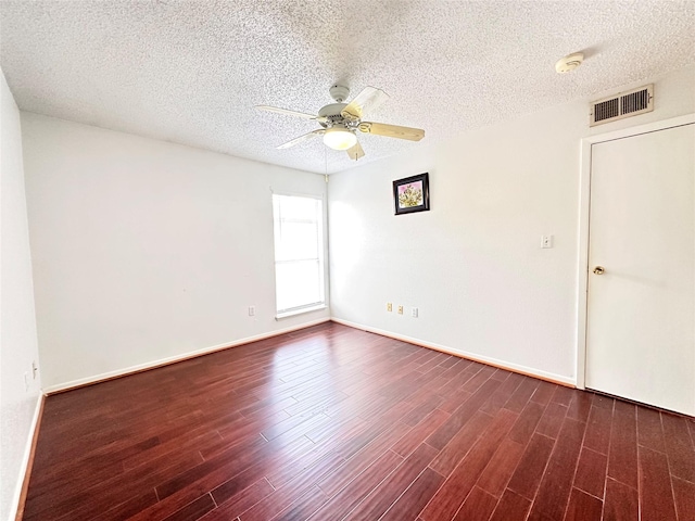 260 El Dorado Blvd Unit 2608, Houston, TX 77598 - empty room with a ceiling fan, dark wood-style floors, a smoke detector, and a textured ceiling