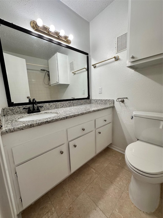 260 El Dorado Blvd Unit 2608, Houston, TX 77598 - full bath with a textured ceiling, vanity, and tile patterned flooring