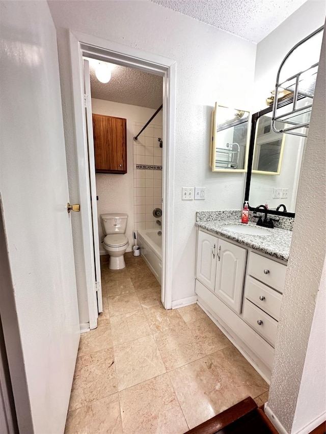 260 El Dorado Blvd Unit 2608, Houston, TX 77598 - full bathroom featuring a textured ceiling, vanity, and washtub / shower combination
