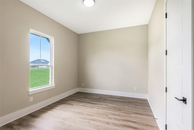 1430 Bluebonnet Ridge Dr, Chappell Hill, TX 77426 - spare room with light wood-style flooring and baseboards