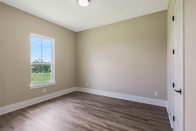 1430 Bluebonnet Ridge Dr, Chappell Hill, TX 77426 - spare room featuring dark wood-style flooring and baseboards