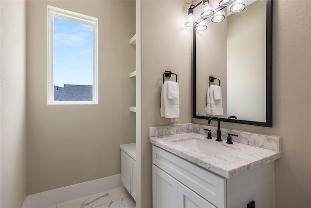 1430 Bluebonnet Ridge Dr, Chappell Hill, TX 77426 - bathroom featuring marble finish flooring and vanity