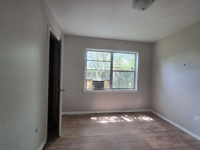 822 Woodhue St, Channelview, TX 77530 - empty room featuring wood finished floors and cooling unit