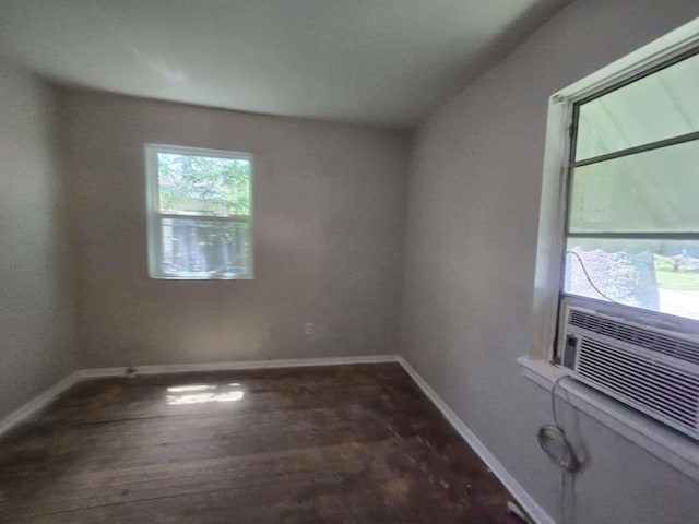 822 Woodhue St, Channelview, TX 77530 - spare room with baseboards and wood finished floors