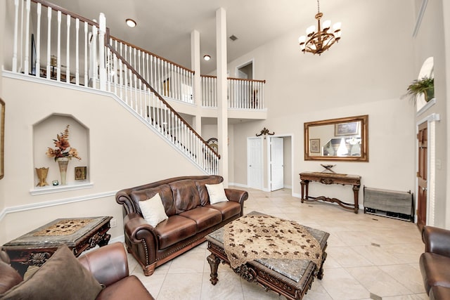 20718 Mansfield Bay Ln, Richmond, TX 77407 - living room with a towering ceiling, a chandelier, light tile patterned floors, and stairway