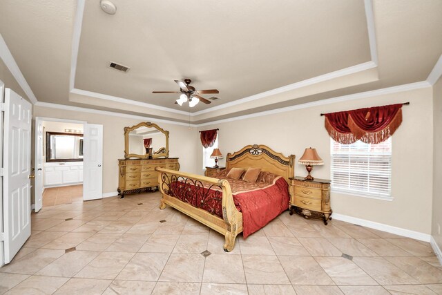 20718 Mansfield Bay Ln, Richmond, TX 77407 - bedroom with a tray ceiling, ornamental molding, light tile patterned flooring, ceiling fan, and connected bathroom