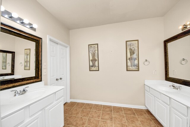 20718 Mansfield Bay Ln, Richmond, TX 77407 - full bath with two vanities and tile patterned floors