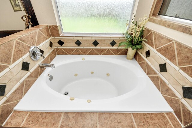 20718 Mansfield Bay Ln, Richmond, TX 77407 - full bath with a tub with jets