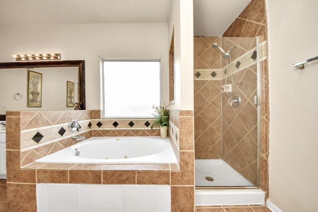 20718 Mansfield Bay Ln, Richmond, TX 77407 - full bathroom featuring a whirlpool tub, a shower stall, and tile patterned flooring