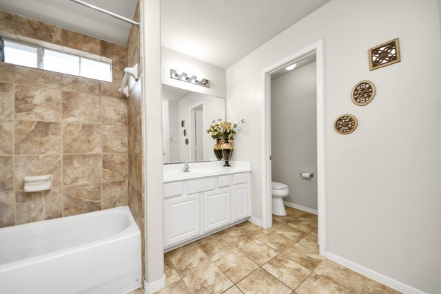 20718 Mansfield Bay Ln, Richmond, TX 77407 - bathroom with vanity, shower / tub combination, and tile patterned flooring