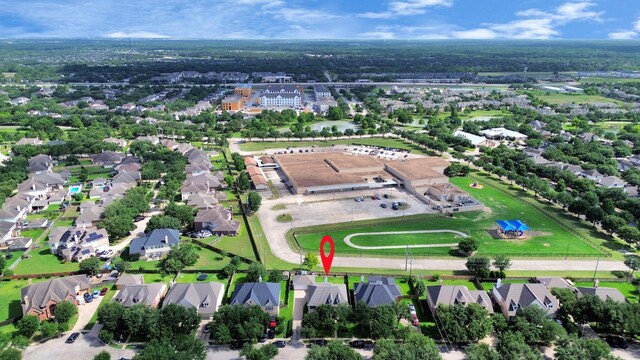 20718 Mansfield Bay Ln, Richmond, TX 77407 - aerial view of property's location with nearby suburban area
