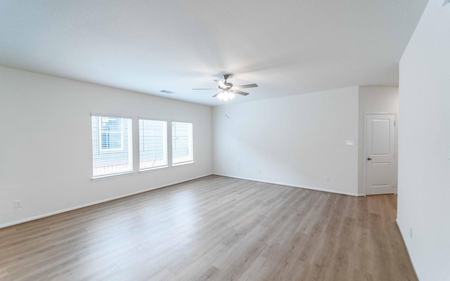 25035 Apricot Ct, Montgomery, TX 77316 - unfurnished room featuring ceiling fan and light wood finished floors