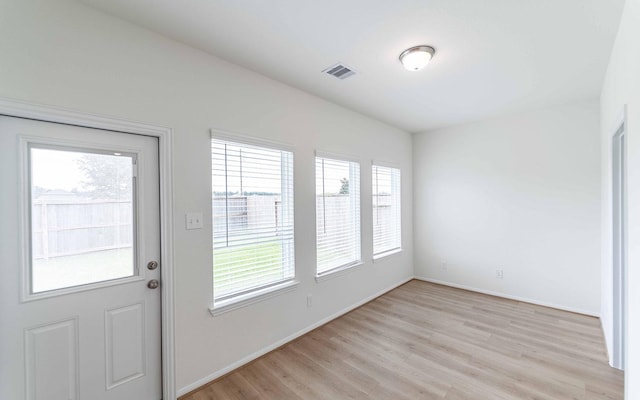 25035 Apricot Ct, Montgomery, TX 77316 - entryway with light wood finished floors and baseboards