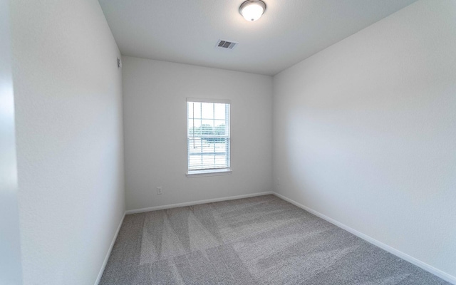 25035 Apricot Ct, Montgomery, TX 77316 - carpeted spare room featuring baseboards