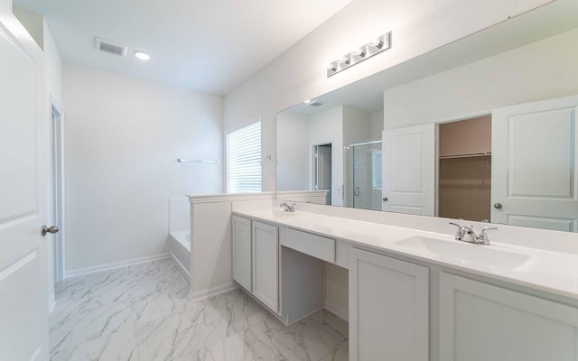 25035 Apricot Ct, Montgomery, TX 77316 - full bathroom featuring double vanity, a bath, a stall shower, and marble look tile flooring
