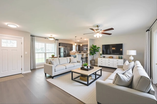 10327 Collingswood Rd, La Porte, TX 77571 - living room with dark wood finished floors and ceiling fan