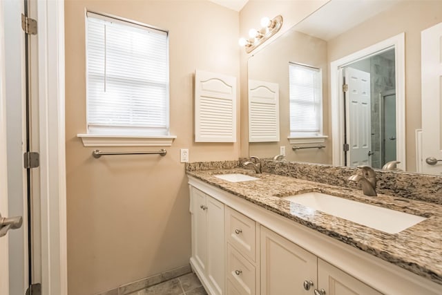 10327 Collingswood Rd, La Porte, TX 77571 - full bathroom with double vanity and an enclosed shower