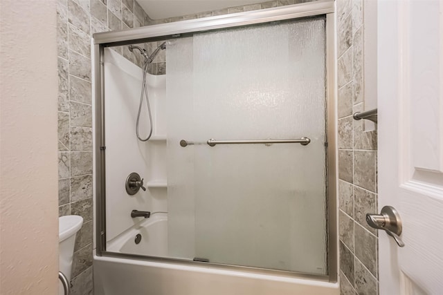 10327 Collingswood Rd, La Porte, TX 77571 - bathroom with shower / bath combination with glass door and toilet