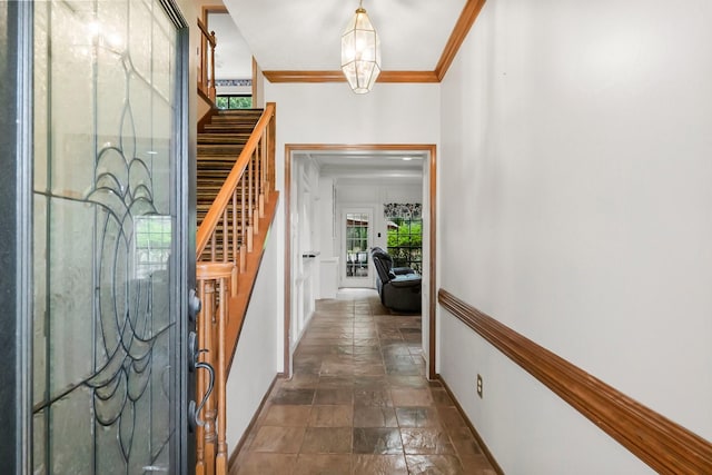 5 Hartwick Ct, Conroe, TX 77304 - entrance foyer with stairs, crown molding, and dark stone finish flooring