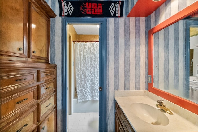 5 Hartwick Ct, Conroe, TX 77304 - bathroom with wallpapered walls, vanity, a shower with shower curtain, and a tub